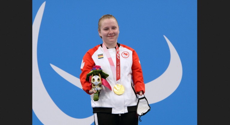 Danielle Doris wins god in the women's 50m butterfly in Tokyo