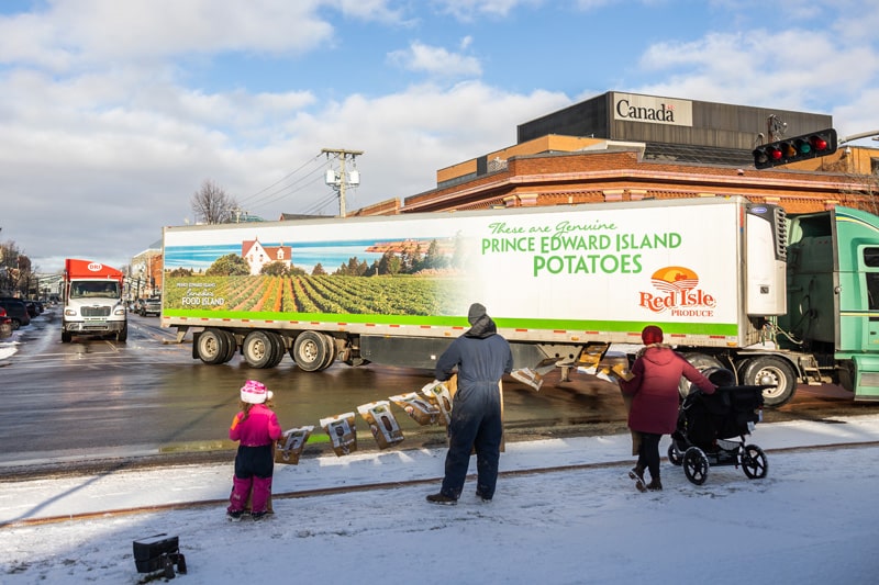 PEI potato farmers stage massive protest parade in Charlottetown ...